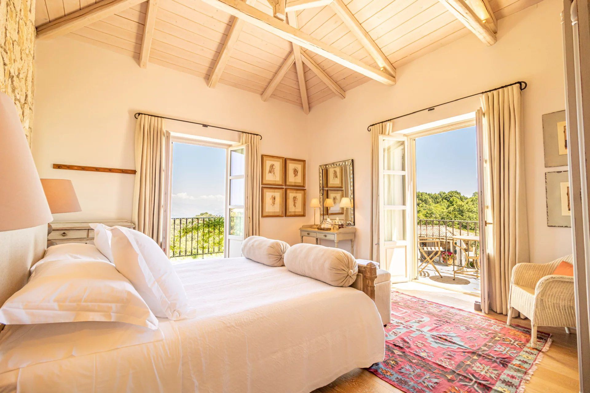 Villa bedroom with views of the Greek hills