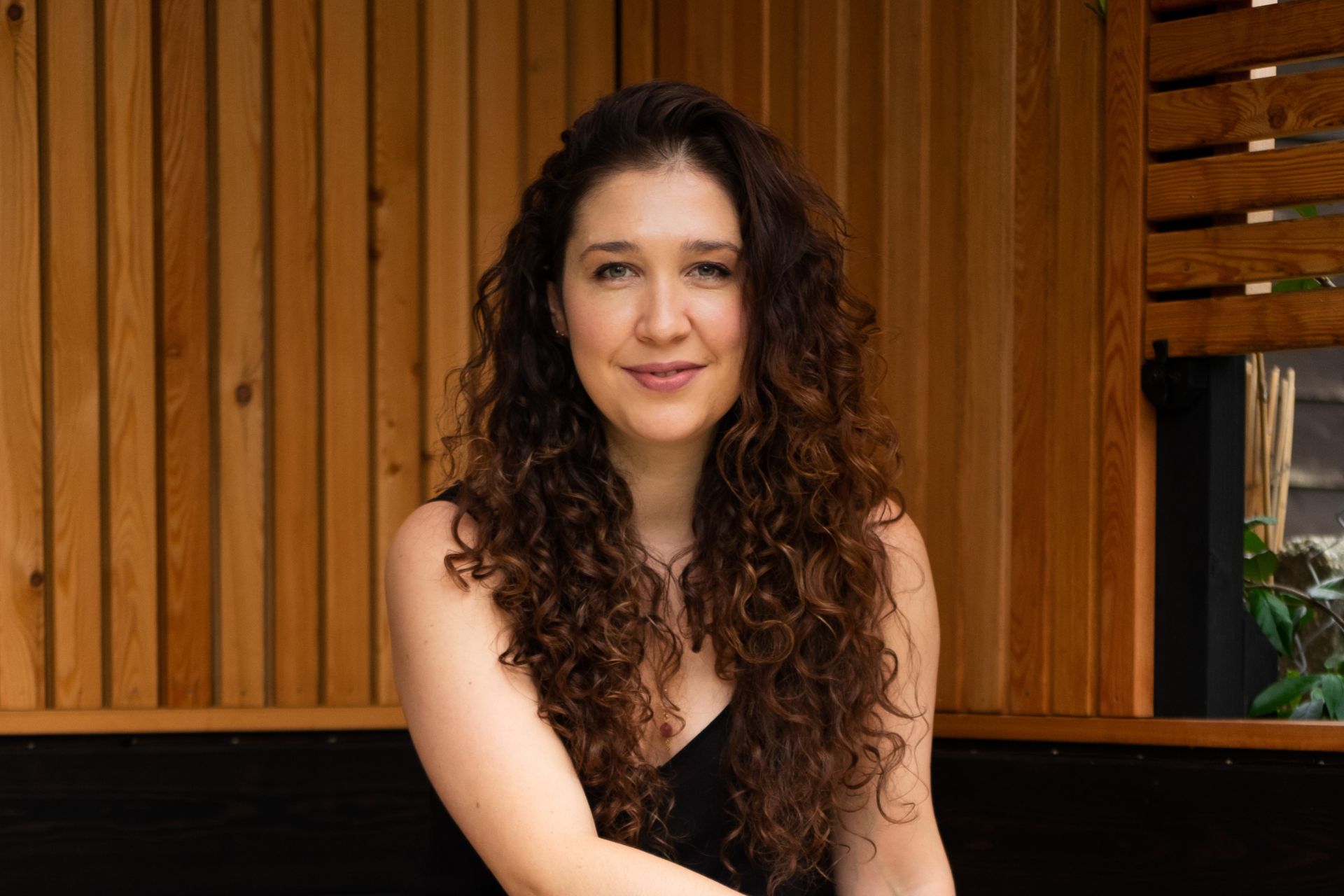 Aisling Connaughton sat in a wood-panelled room