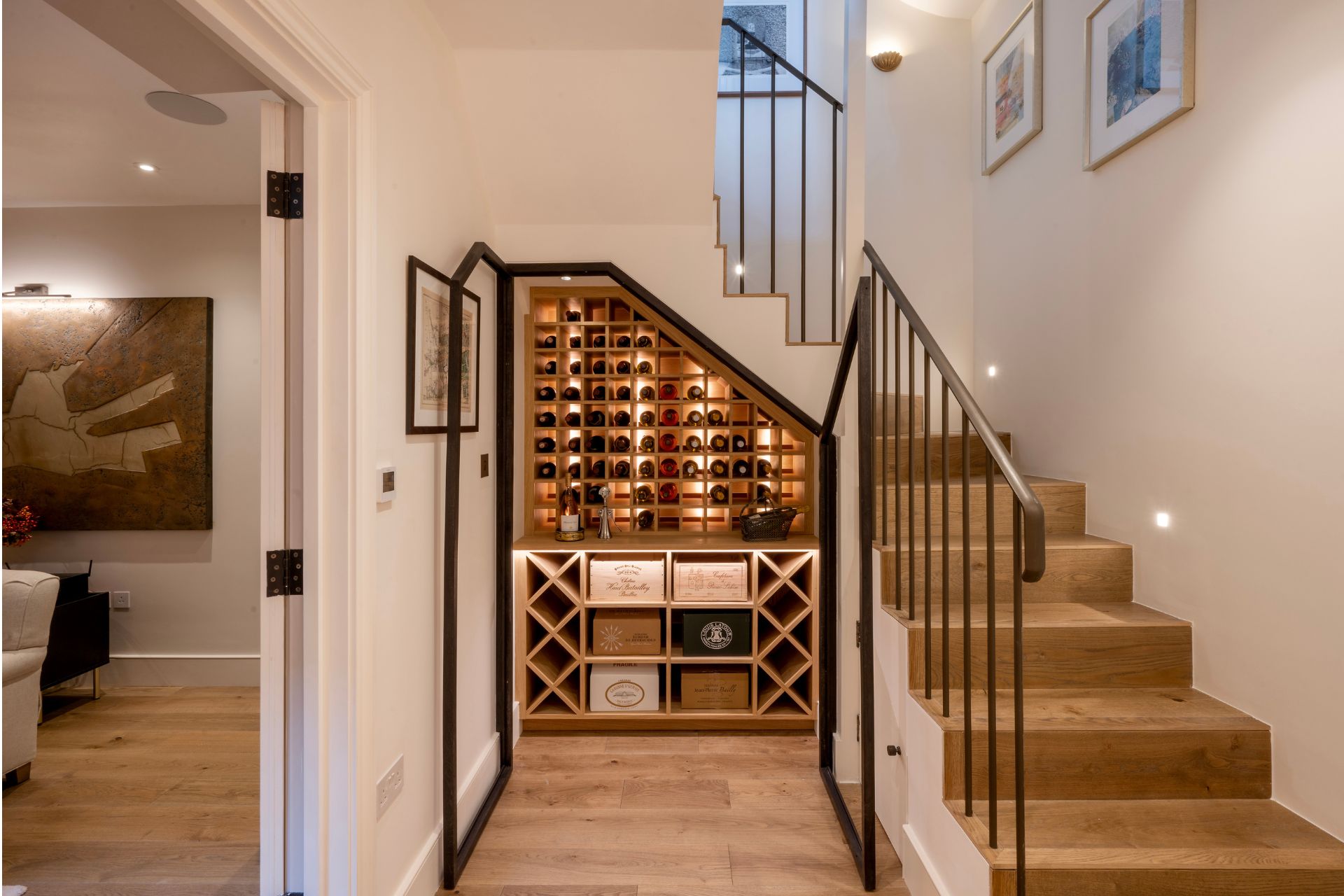 Staircase with glass wine cellar