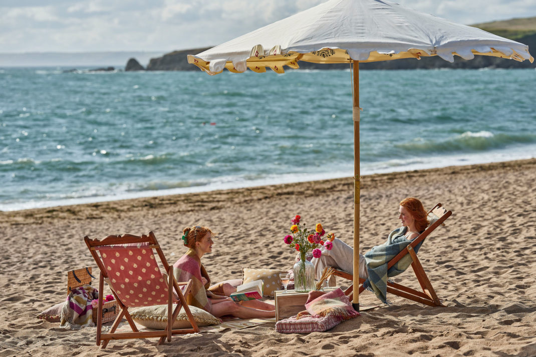 Susie Watson Design parasol on the beach