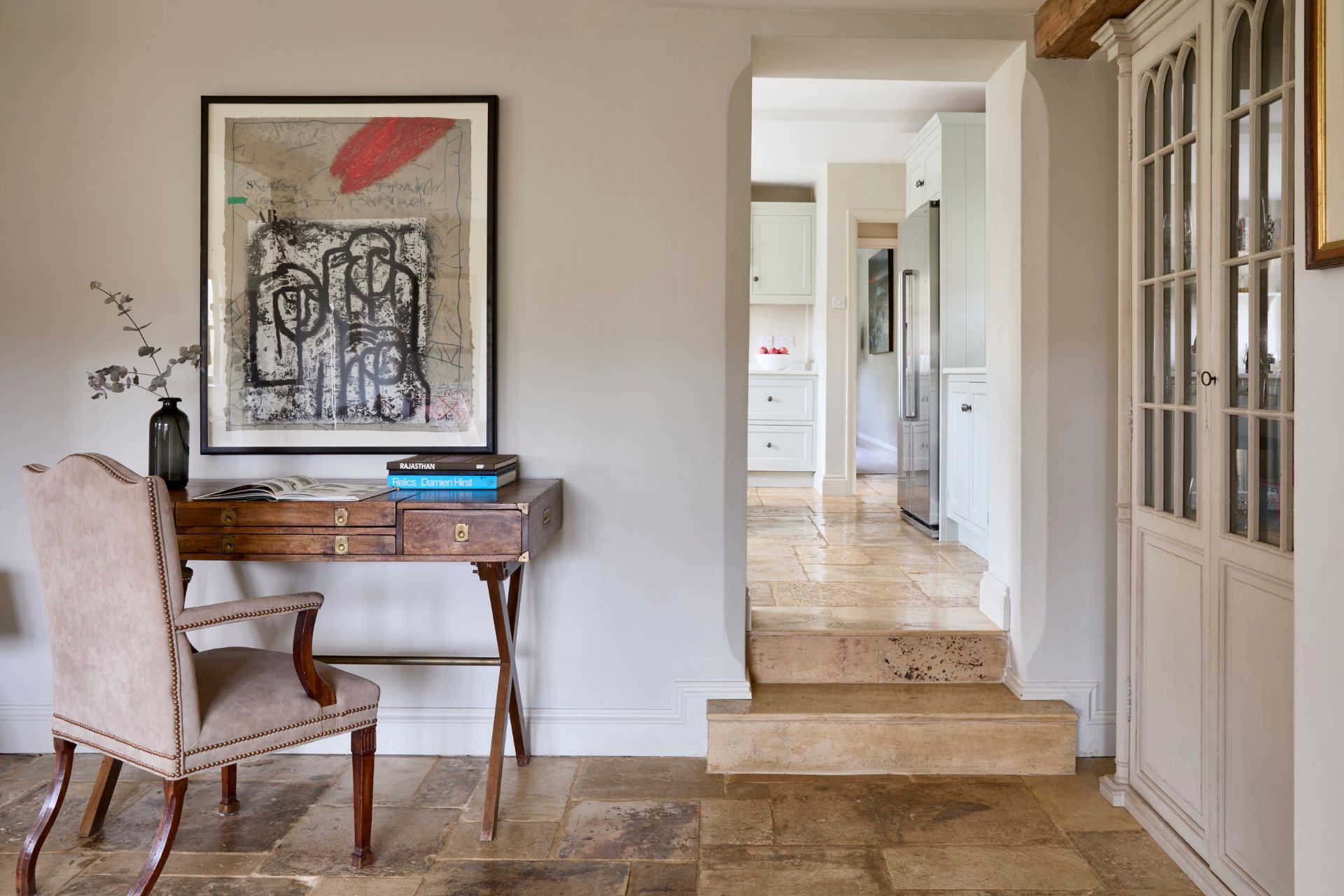 Study with stone floors and wooden desk