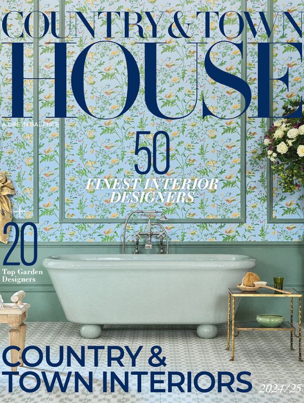 C&TH Interiors cover 2024/25, featuring a bathroom with blue floral wallpaper and a freestanding bath