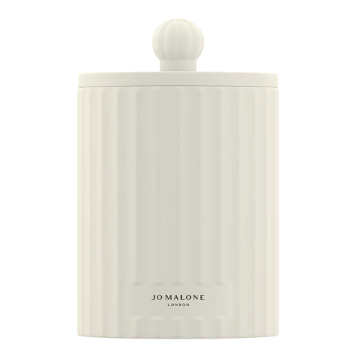 White porcelain candle with Jo Malone branding
