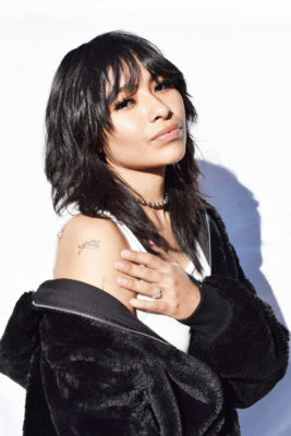 Woman with wolf cut hair style