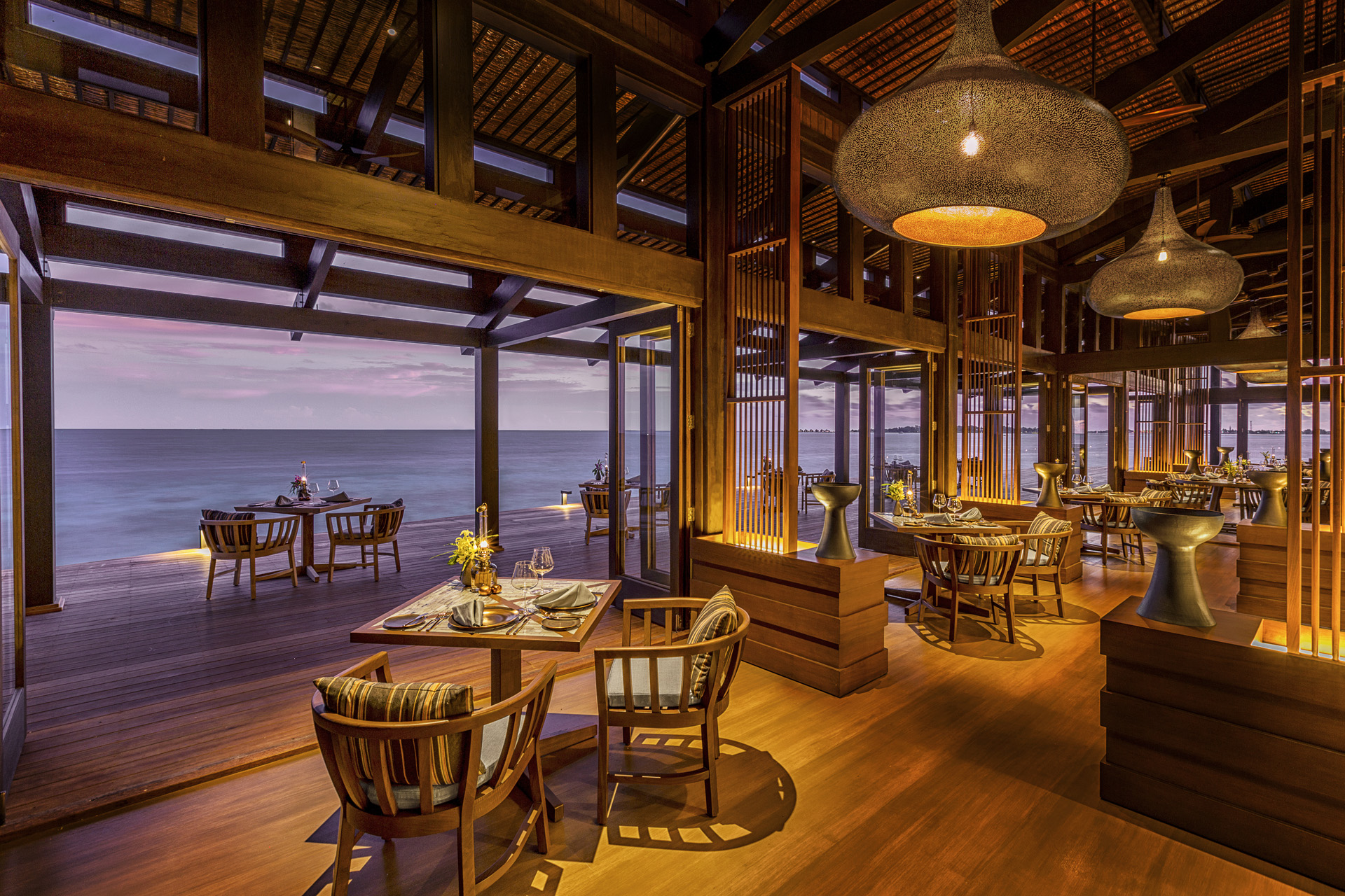 A restaurant in the Maldives at dusk