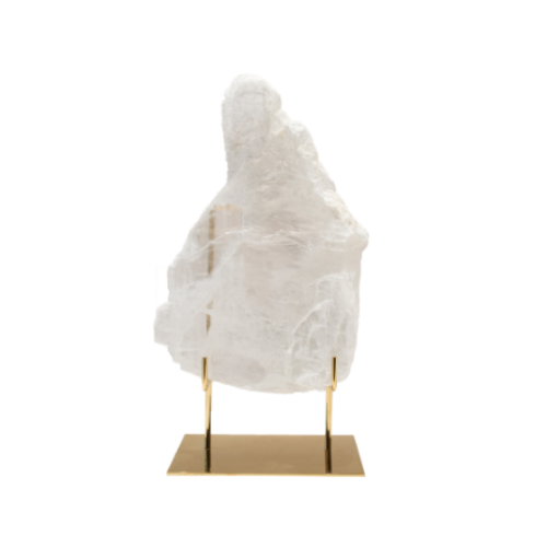 Clear stone on a brass base