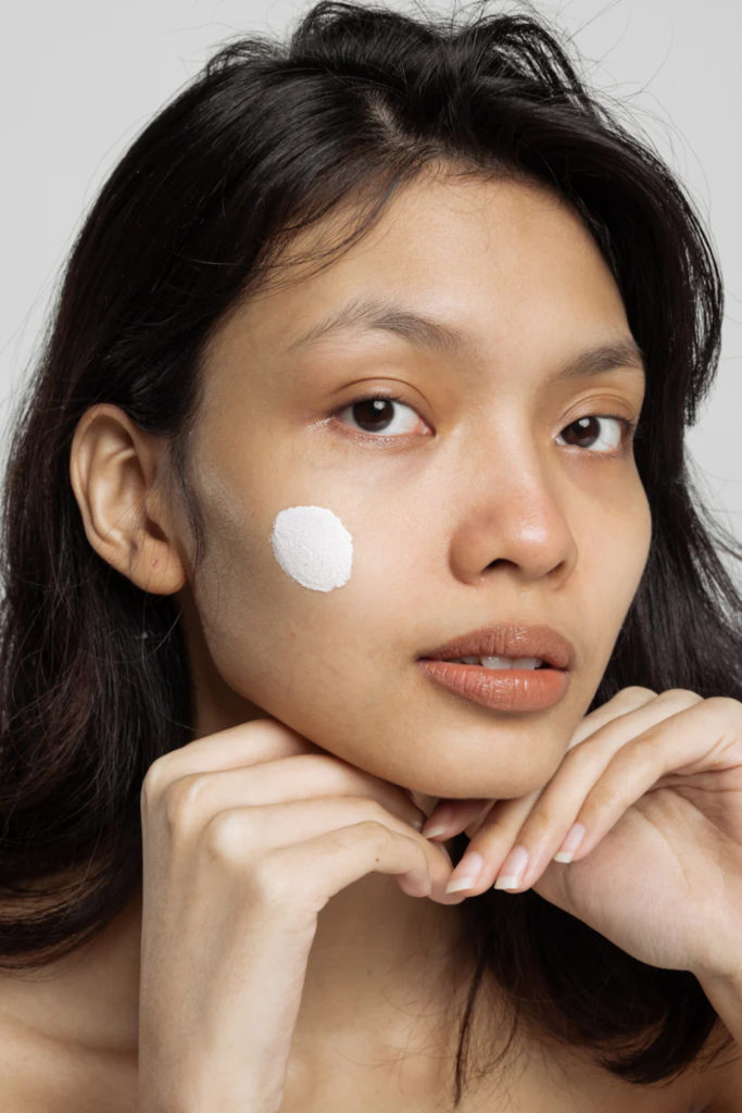 Woman wearing face SPF cream