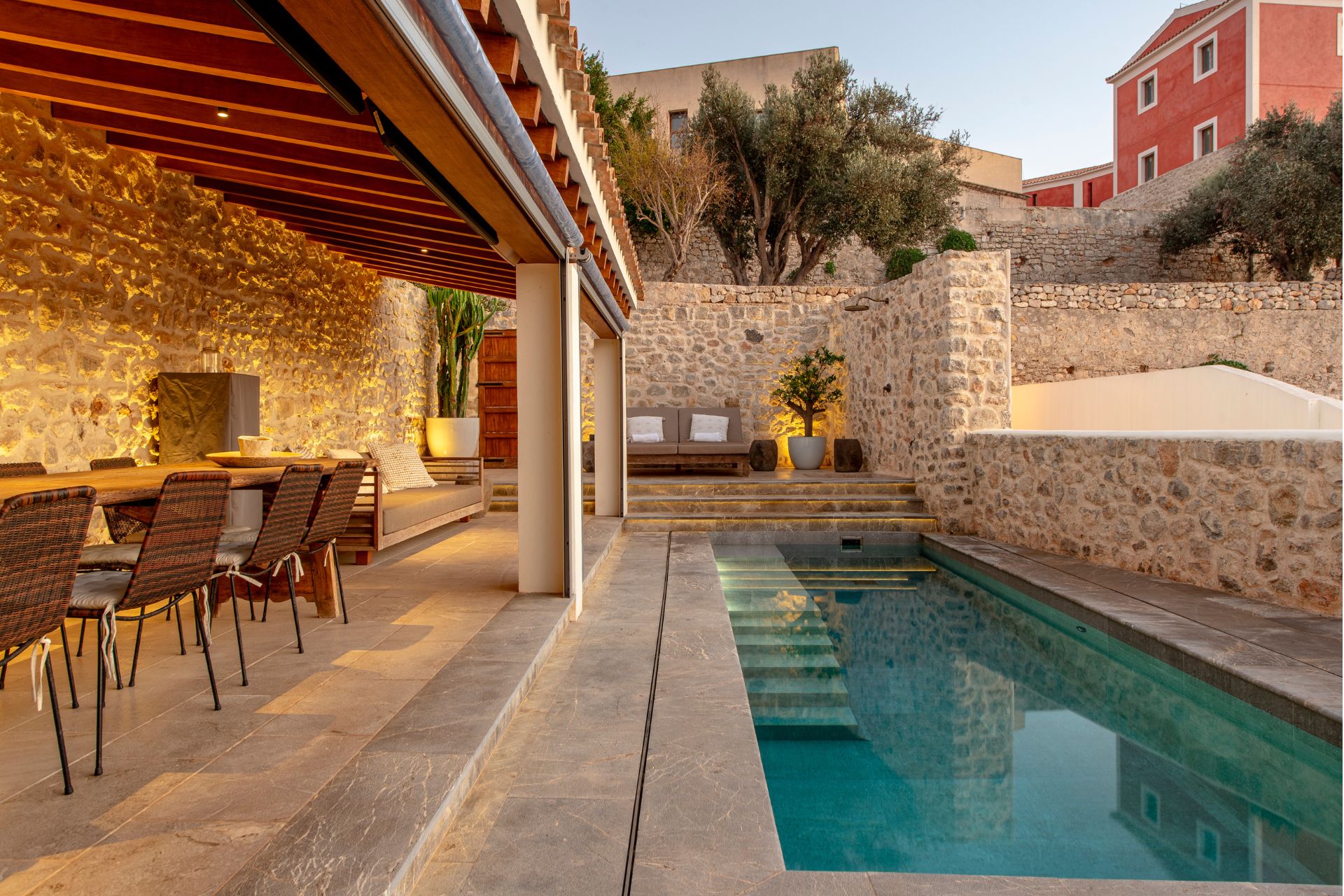 Outdoor pool with covered dining area