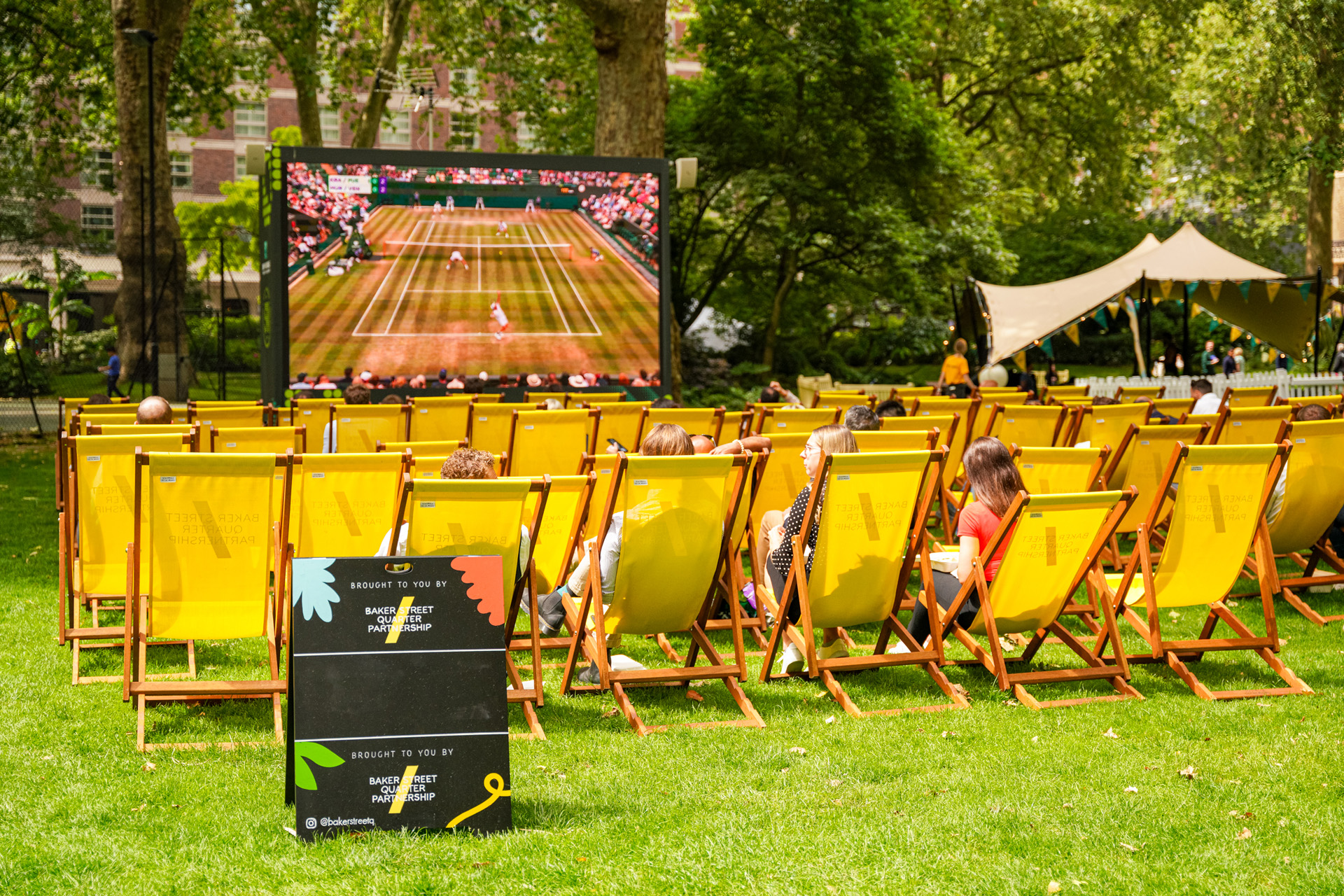 A big screen and deckchairs to watch sport in Portman Square