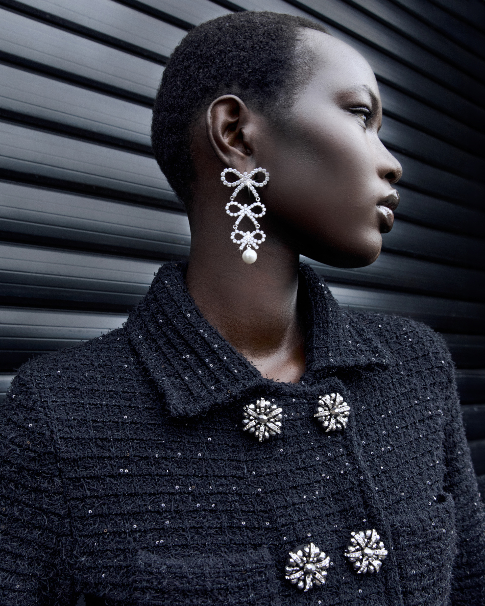 Woman wearing bow earrings