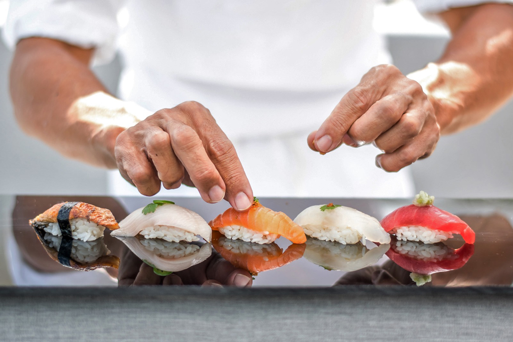 A chef making sushi