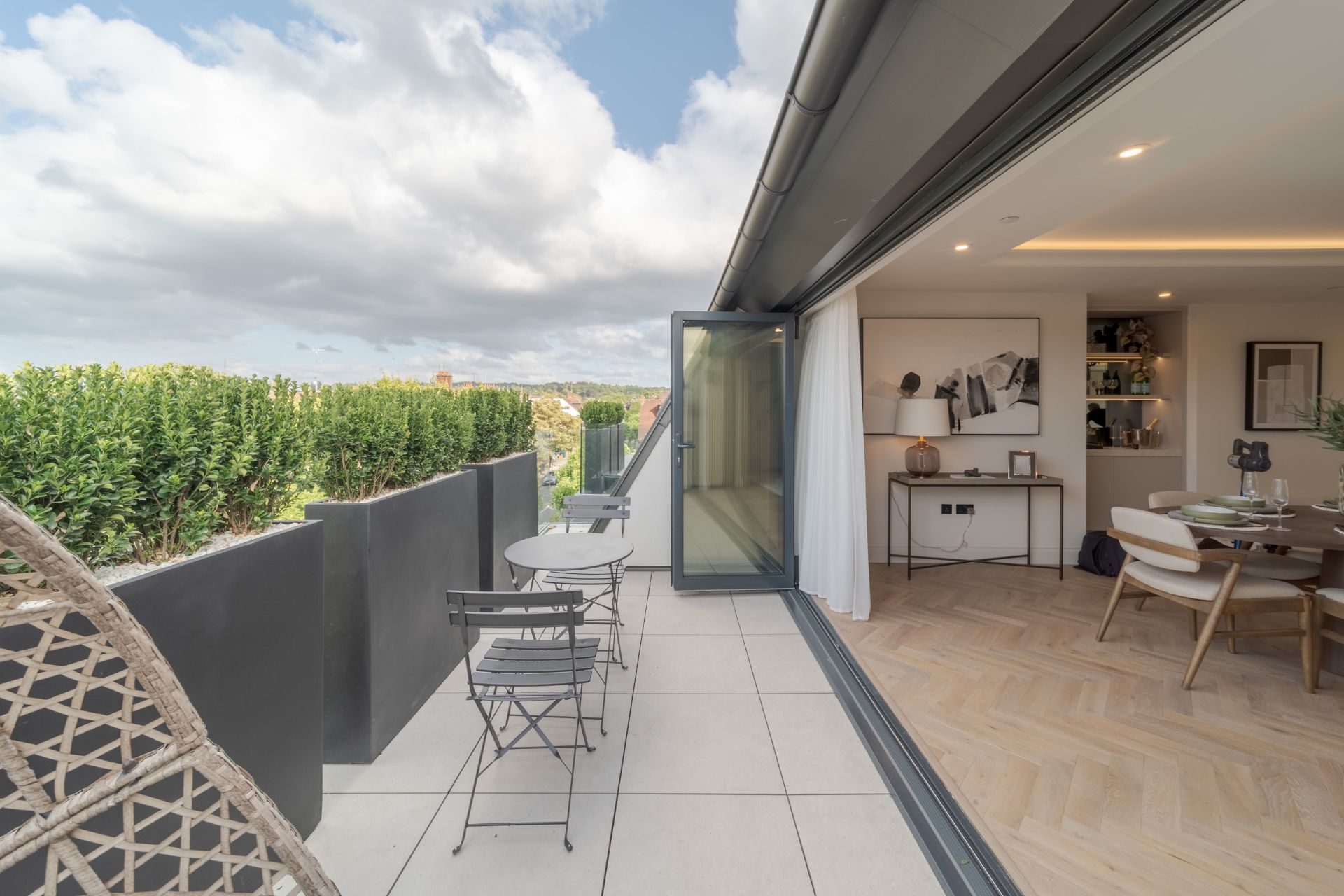 Large terrace with floor-to-ceiling bi-fold doors