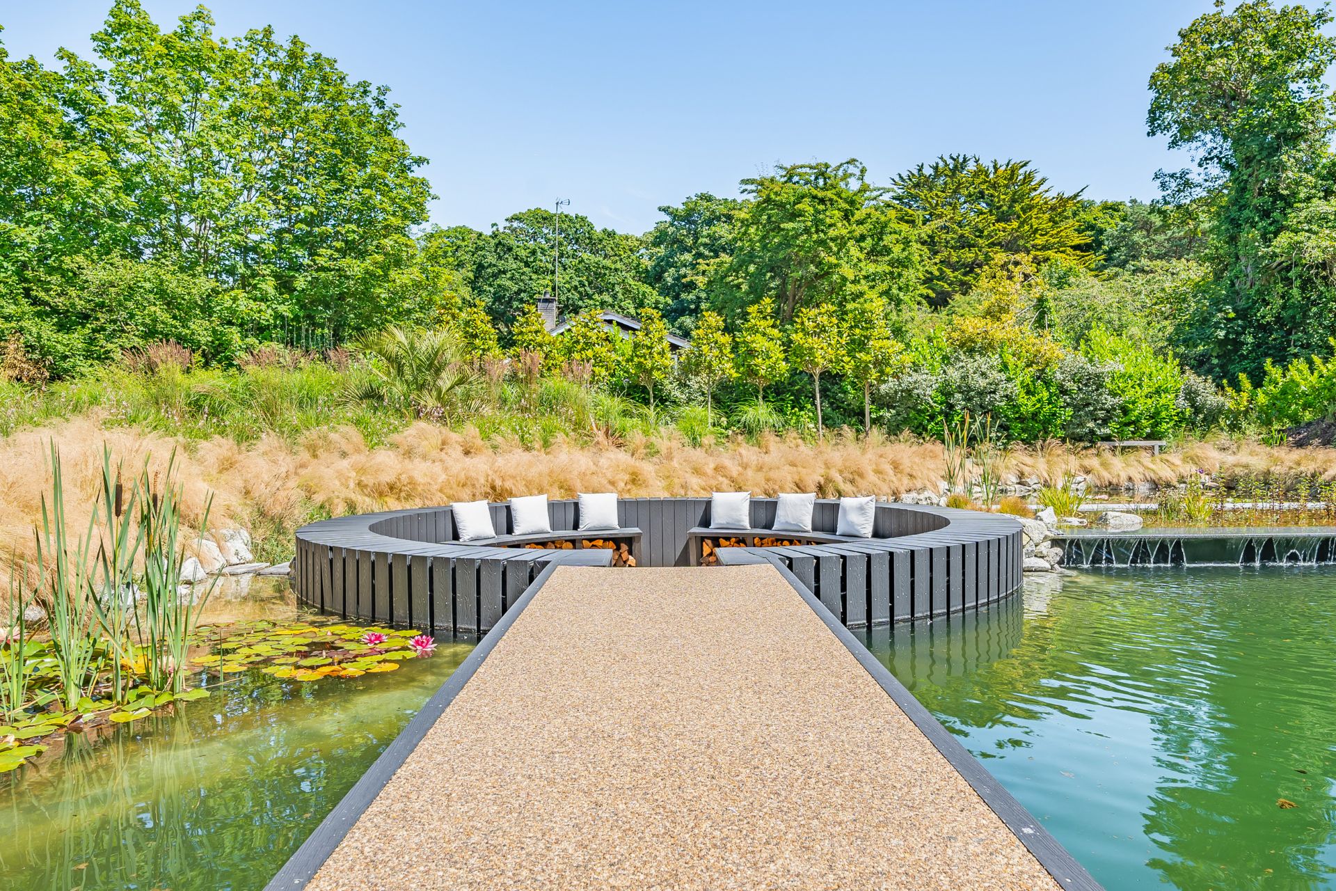 Hot tub area with seats surrounding it.