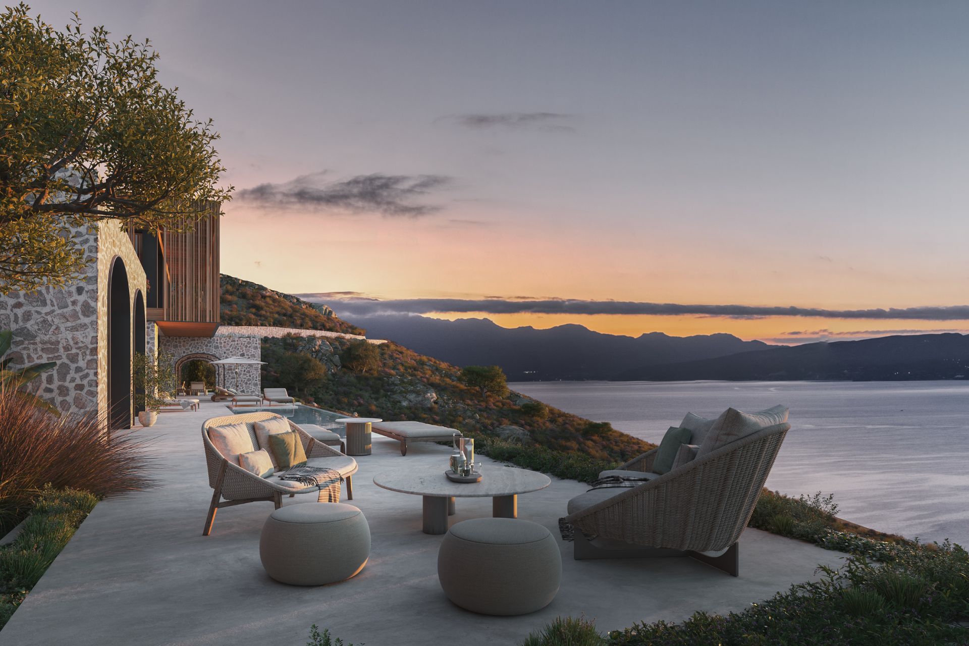 Terrace with sofas and a view of the ocean
