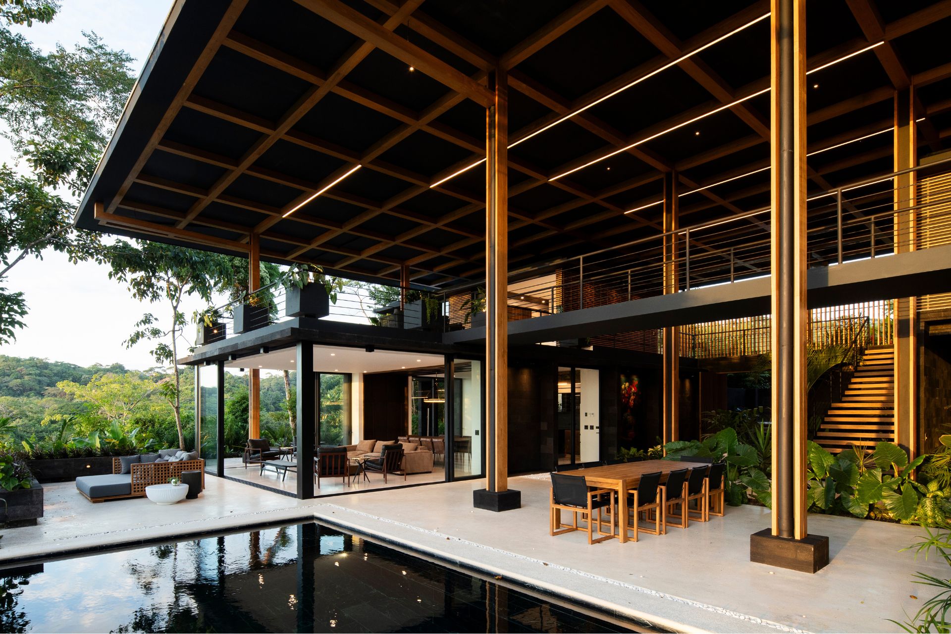 Jungle compound with wood canopy roof and infinity pool
