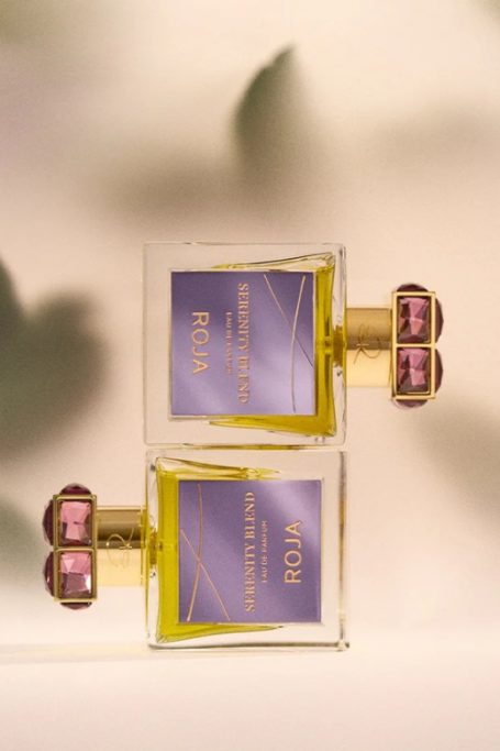 Perfume bottles stacked on top of each other