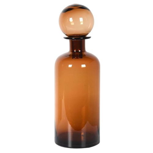 Amber glass bottle with spherical topper