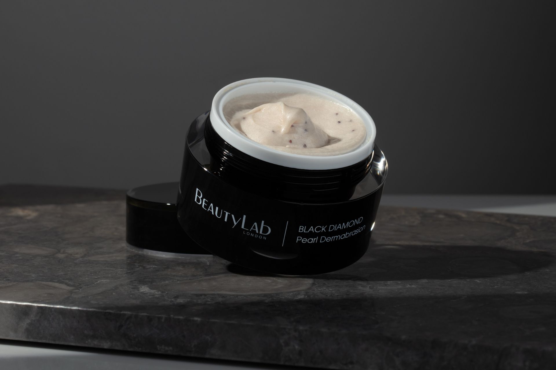 BeautyLab pearl dermabrasion in a black tub.