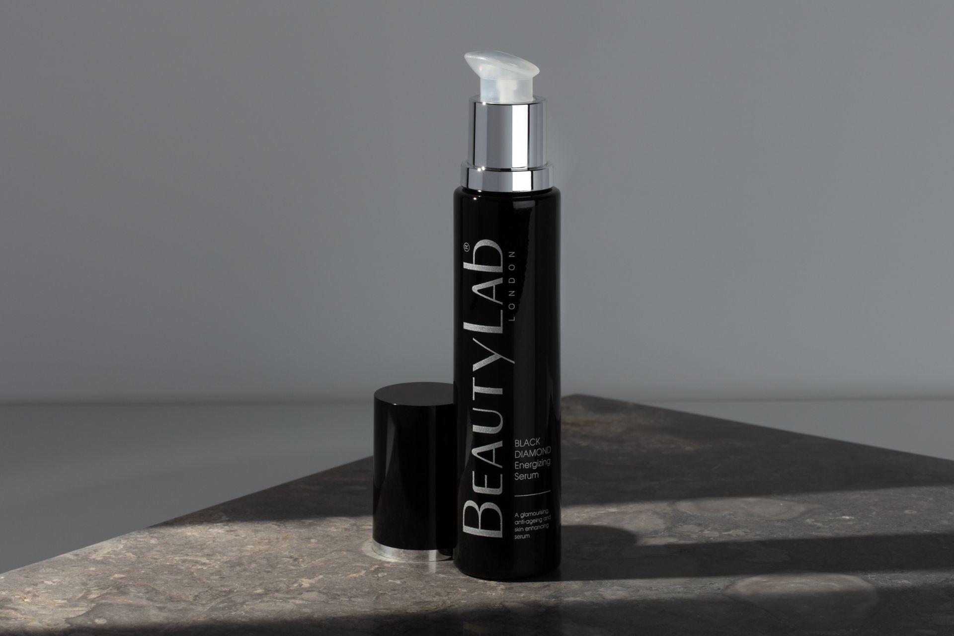 BeautyLab energising serum in a black bottle.