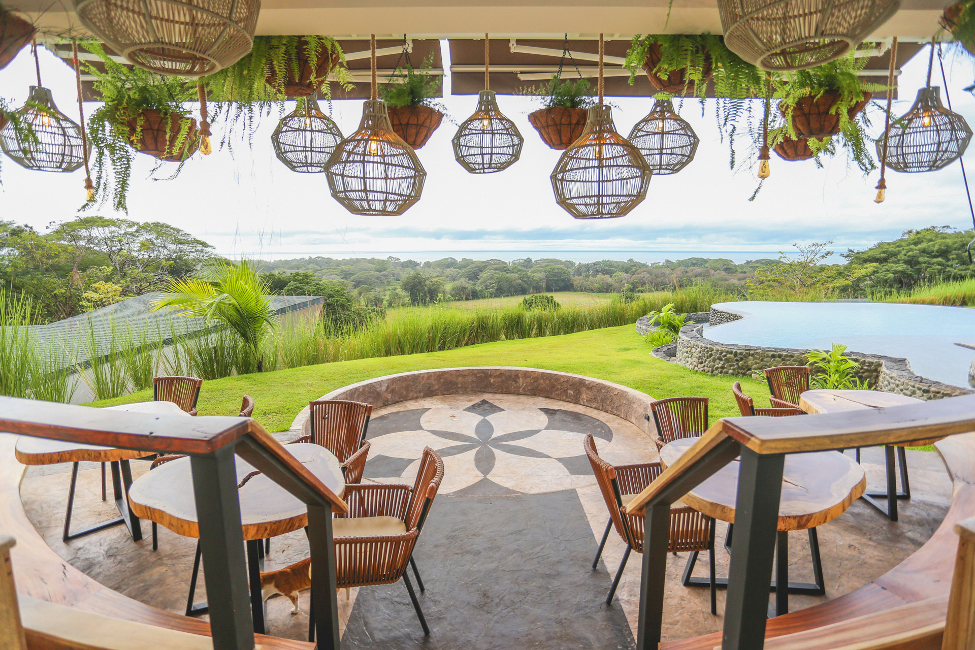 Tables and chairs beside a swimming pool