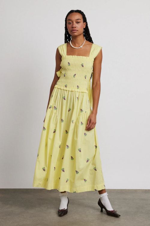 Woman in yellow dress