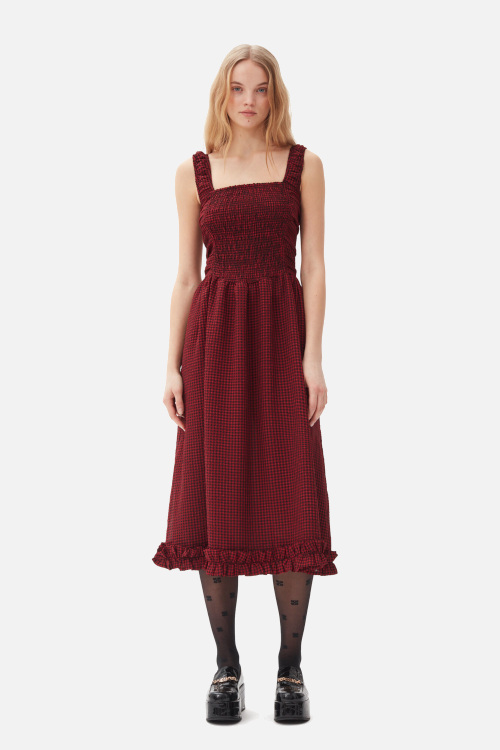 Woman in red fit and flare dress