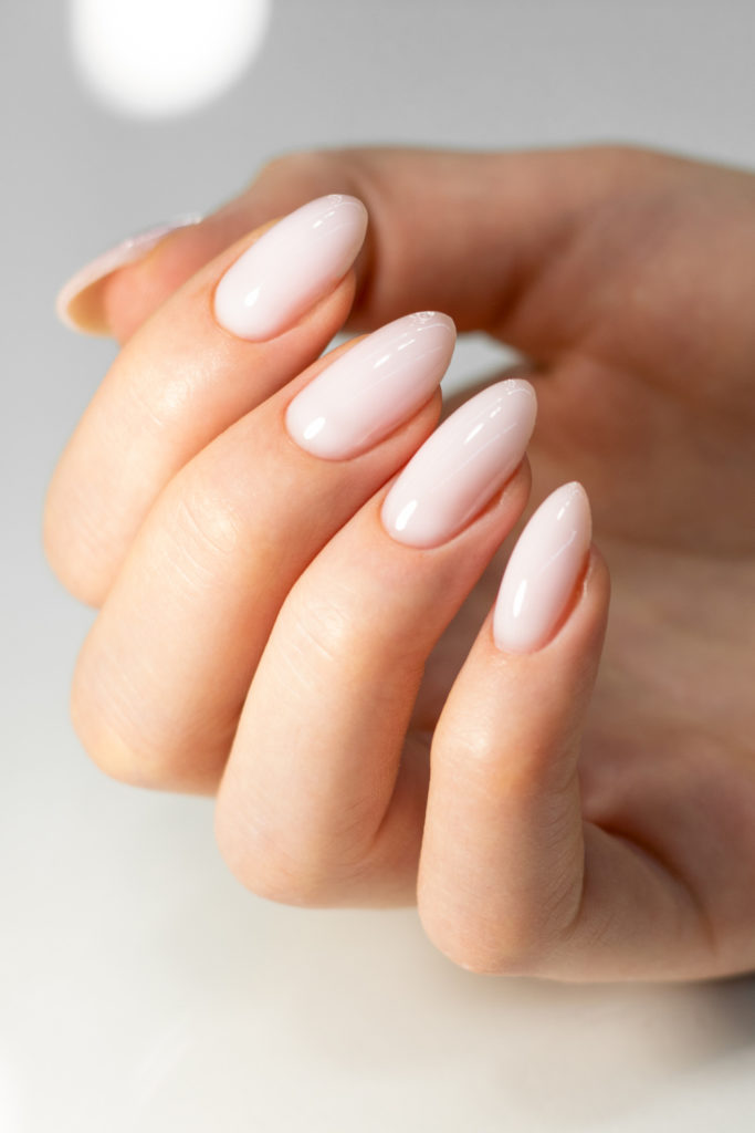 Hand with coconut nails