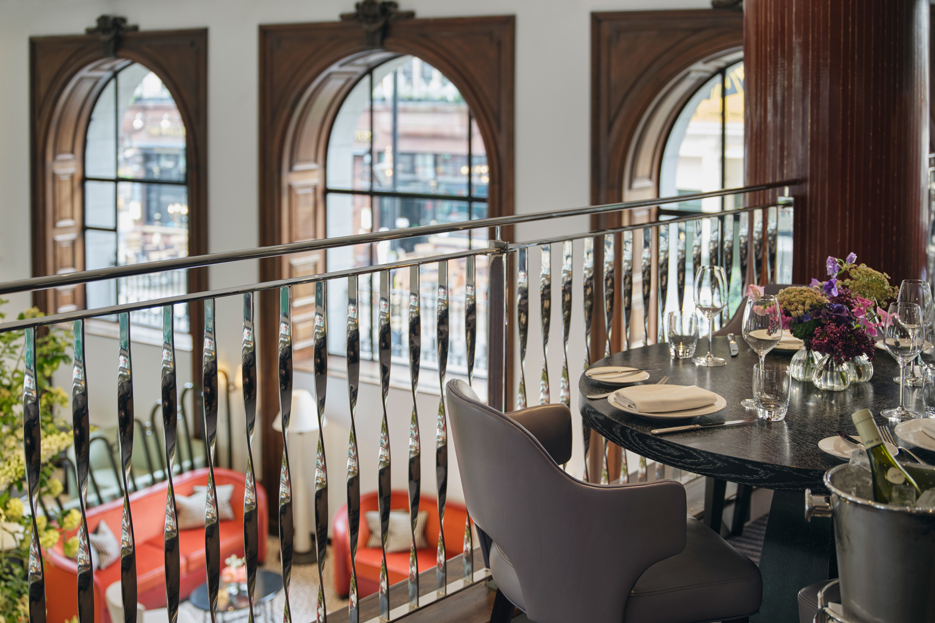 Restaurant balcony overlooking bar and big windows