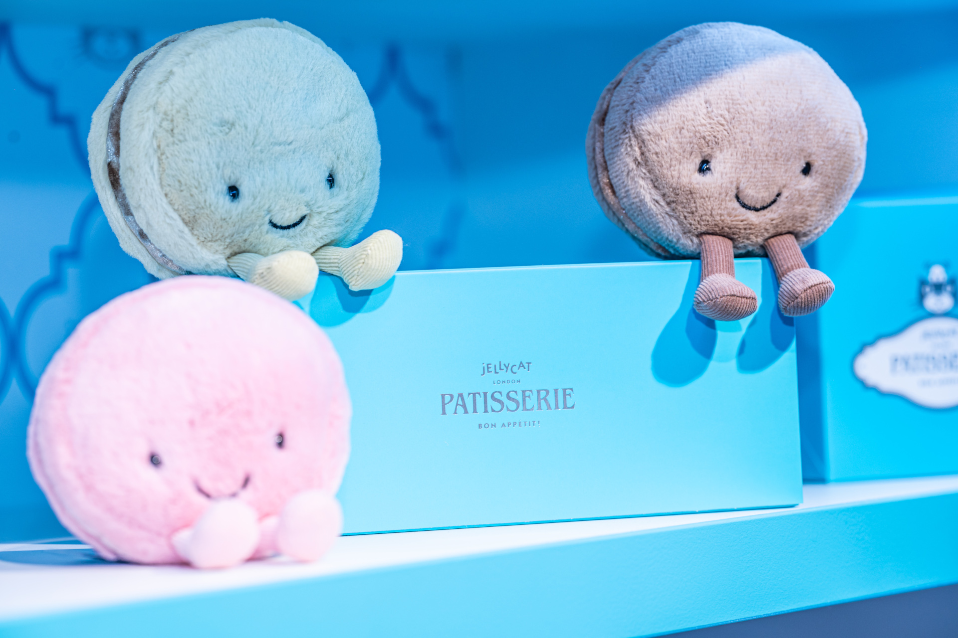 Plushie macarons on box