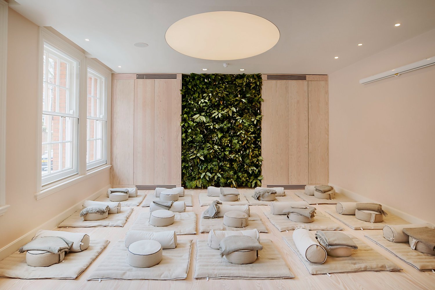 Wellness studio space with mats and blankets