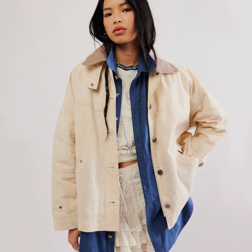 Woman in cream coat