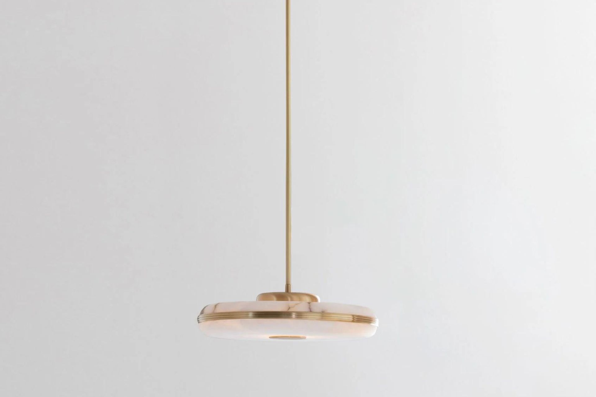 Gold pendant light with marble finish