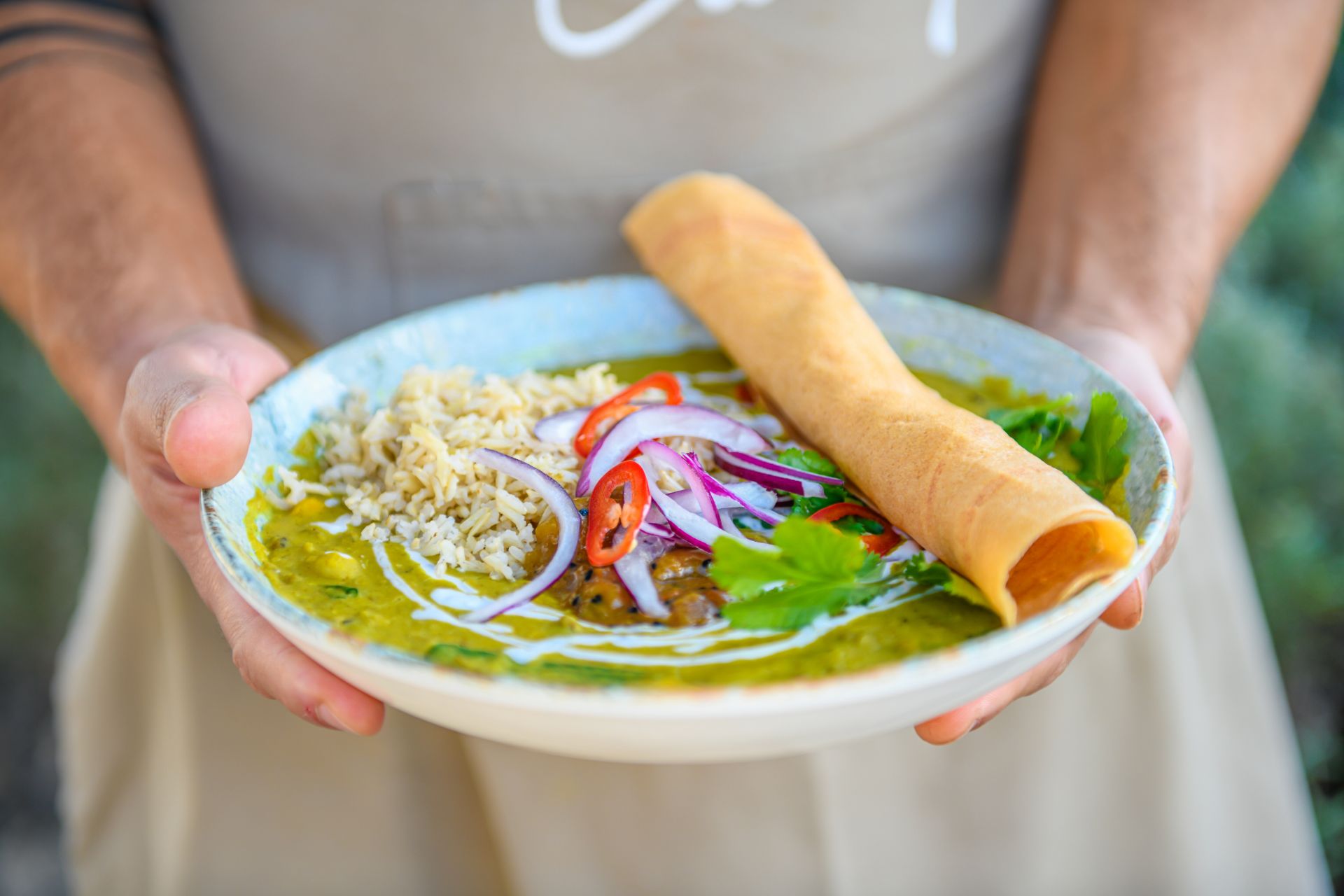 Bowl of salad with tortilla wrap