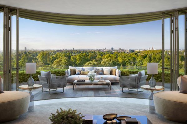 Penthouse living room with curved glass windows overlooking Hyde Park