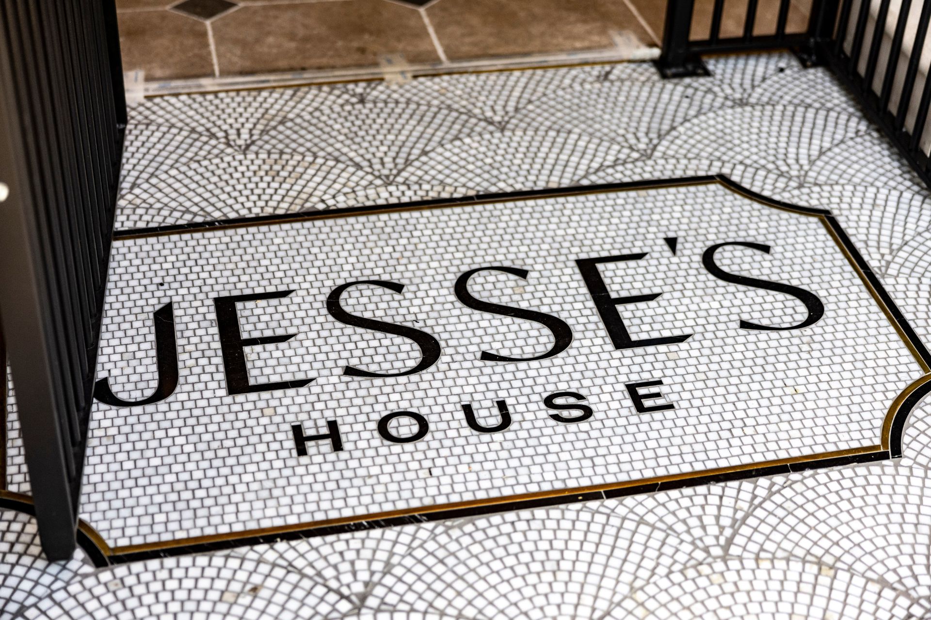 Tiled Jesse's House sign on white background