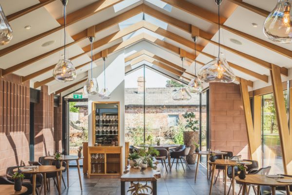 Barn conversion restaurant with blown glass pendant lights