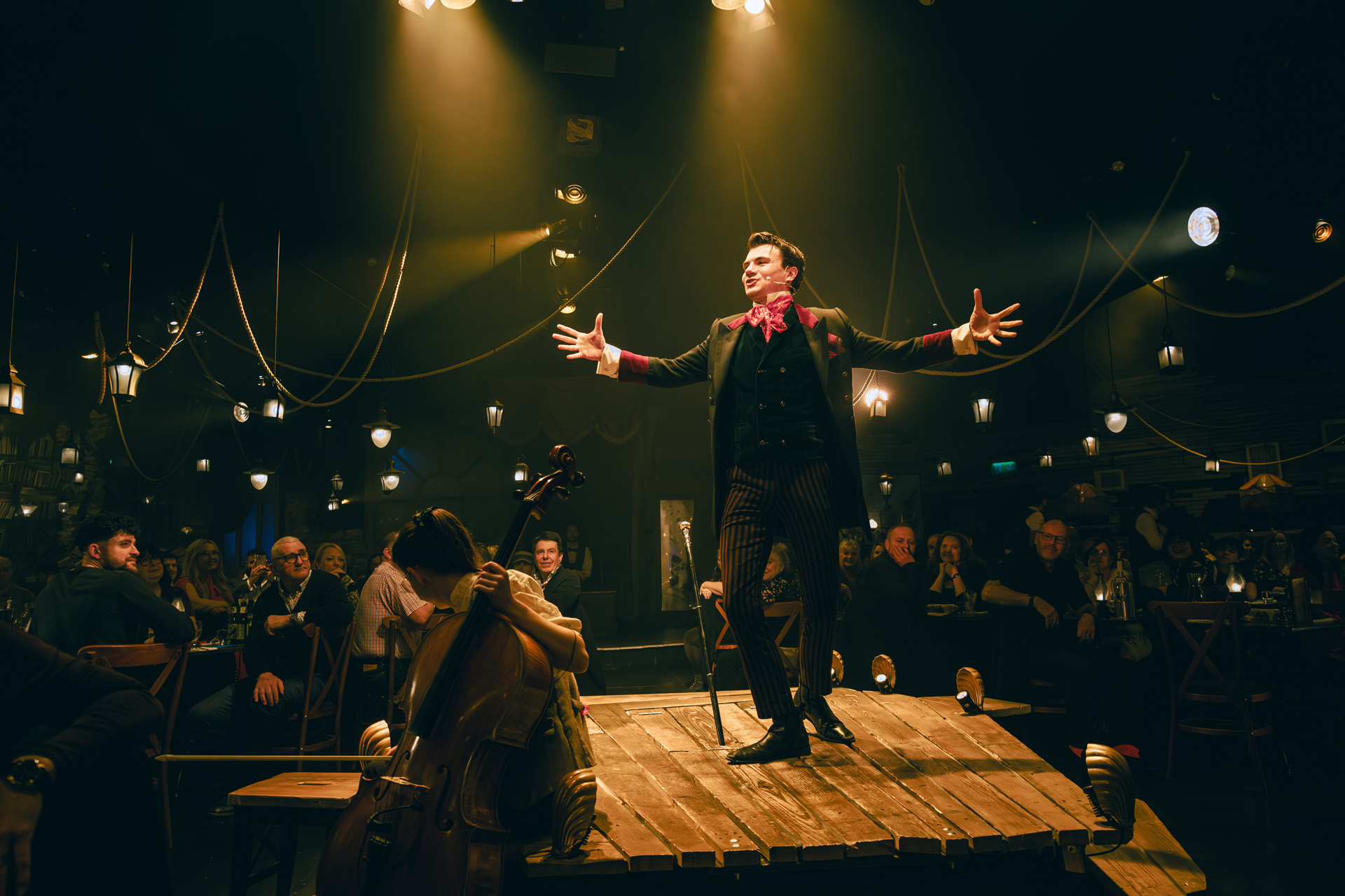 Alex Phelps performing in The Great Christmas Feast