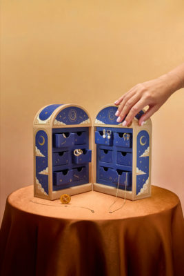 Blue and gold box with drawers full of jewellery