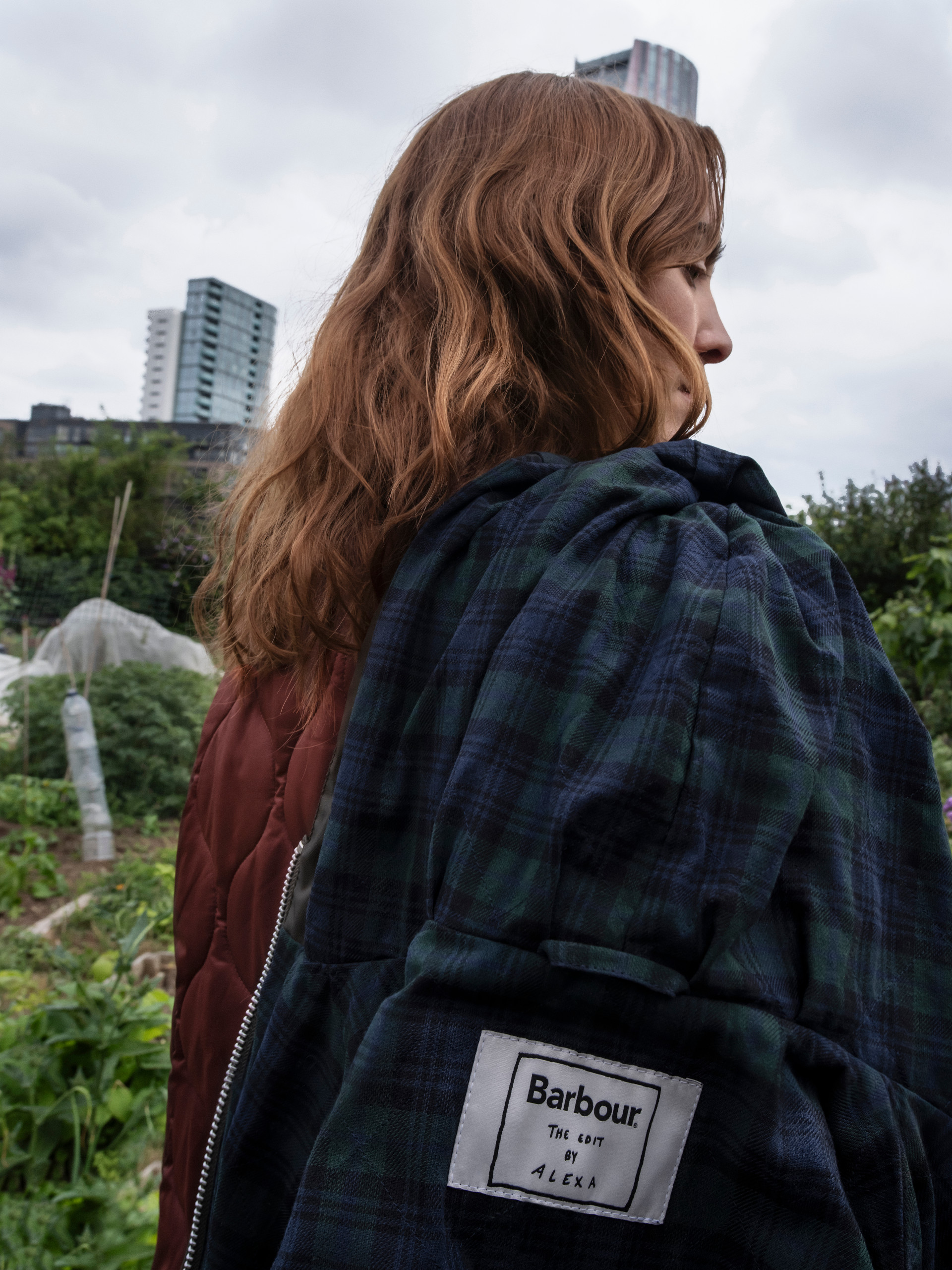 Woman wearing tartan jacket