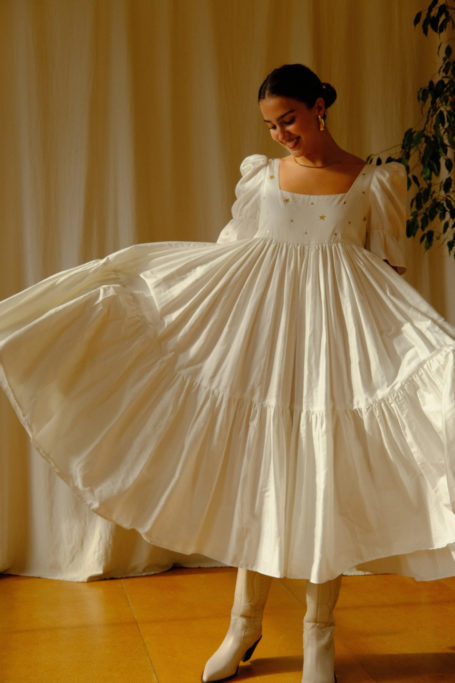 Woman fanning out dress