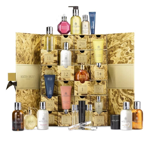 Gold beauty advent calendar box filled with fragrance products