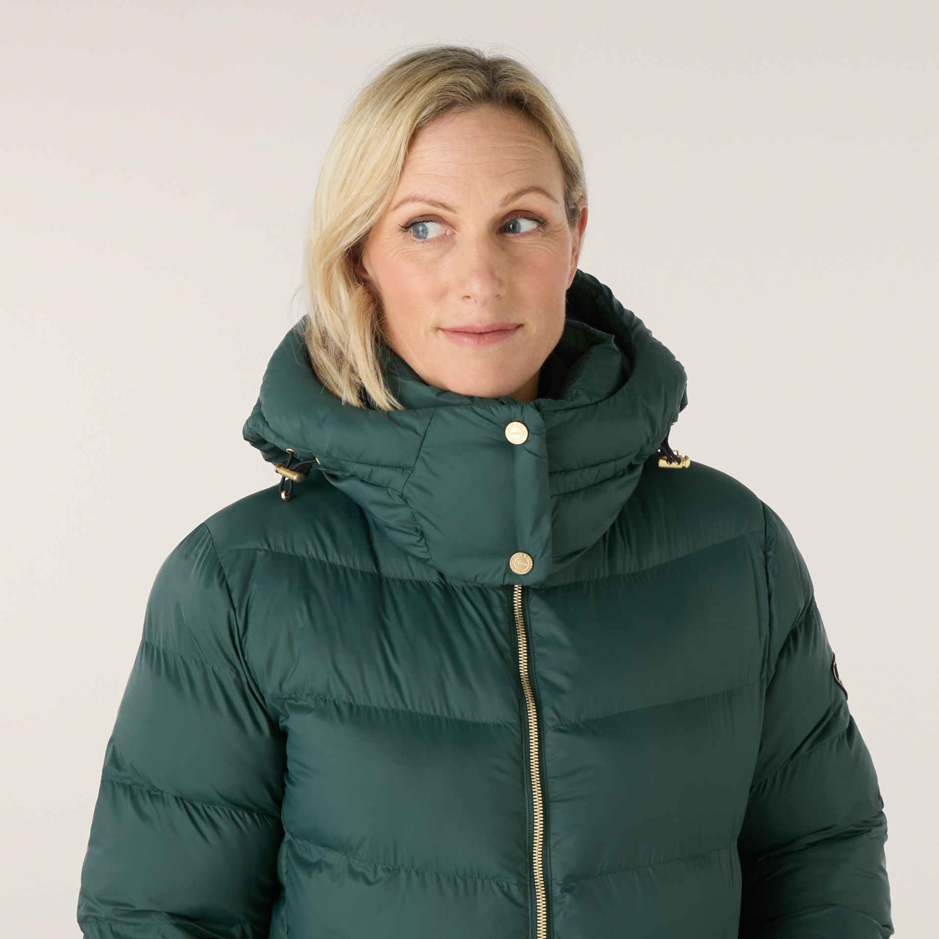 Zara Tindall in green coat