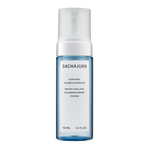 Blue and white bottle of mousse for creating a textured bob