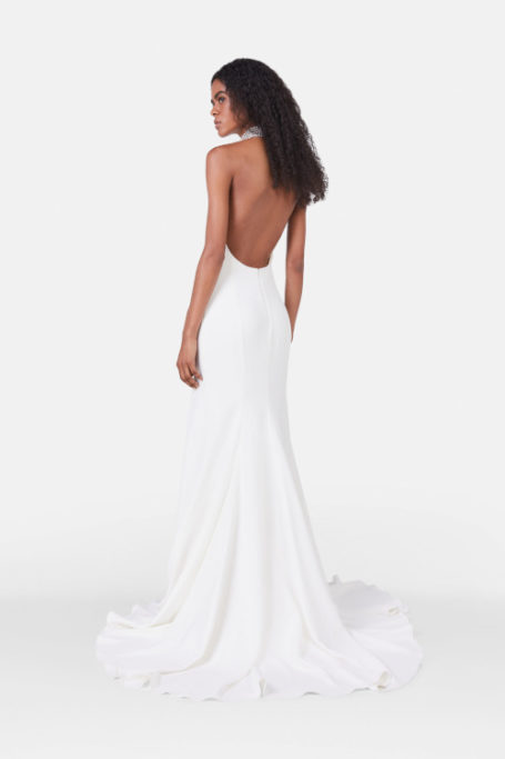Woman in backless wedding dress