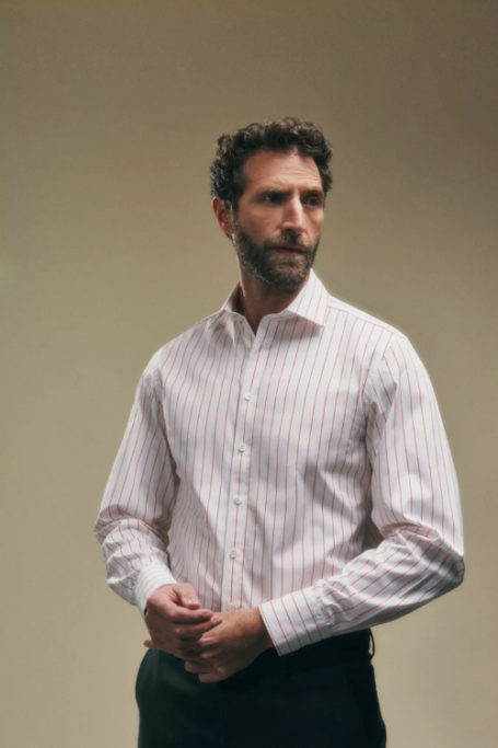 Man in pink striped shirt