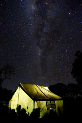 Tent at night with starry sky | star sign sleep routines