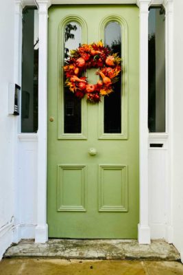 autumn wreath on a green door