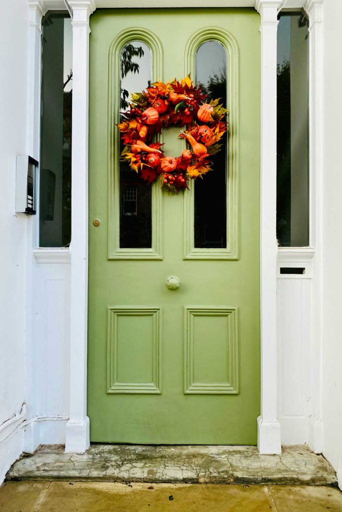 autumn wreath on a green door