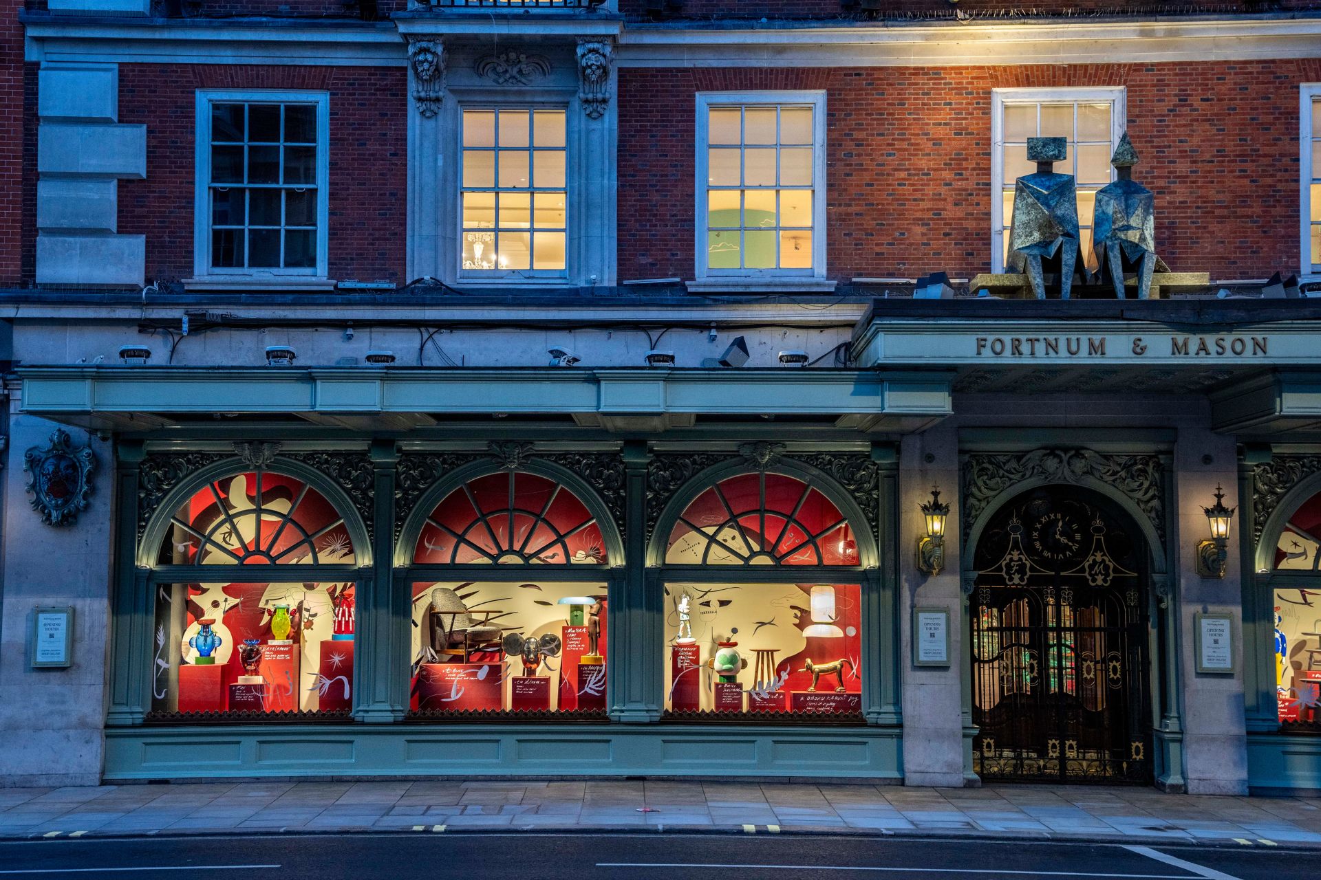 Fortnum and Mason window display at dusk