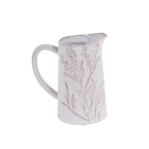 White ceramic jug with floral pattern